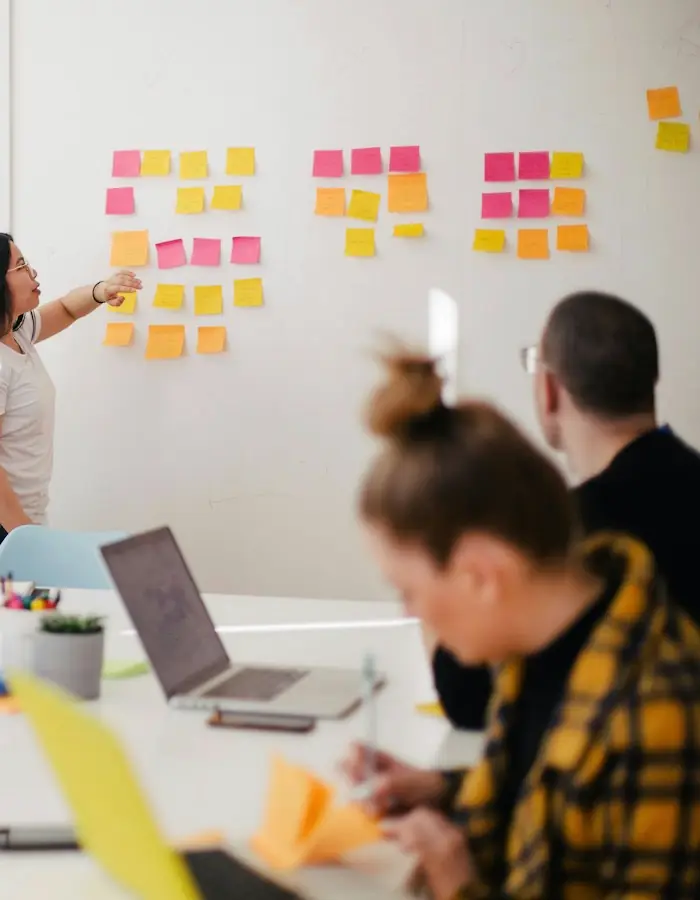 Team mapping a client project on a strategy wall
